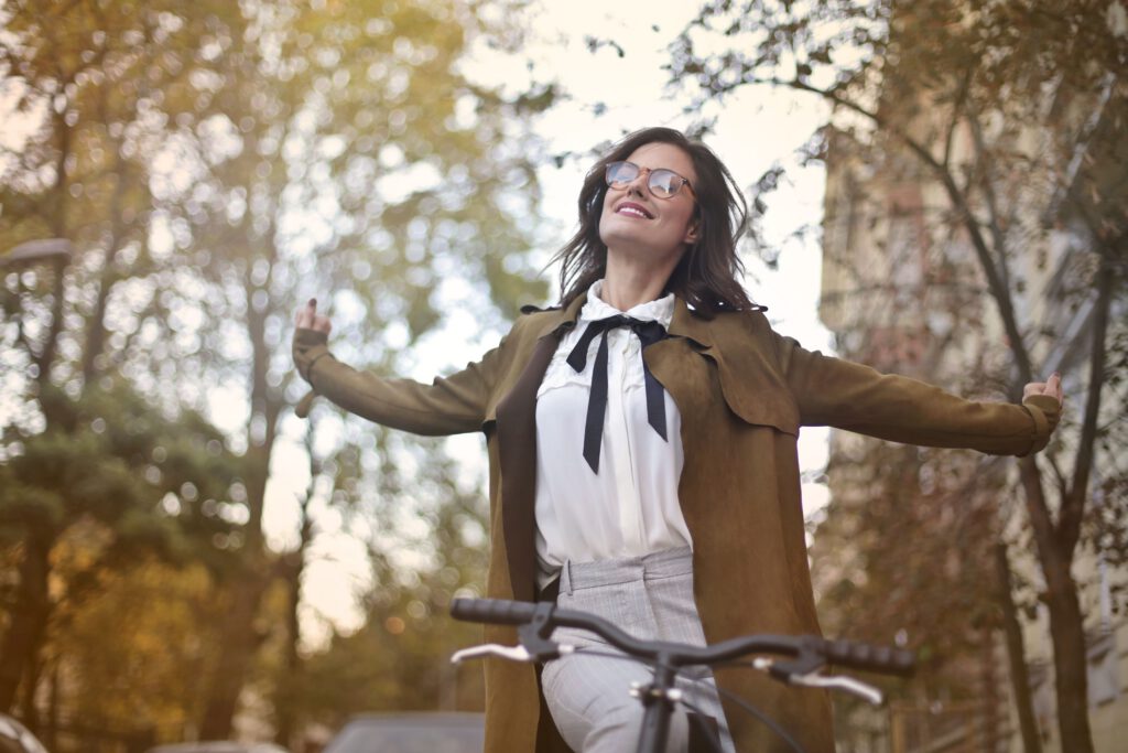 Person moving forward outdoors with a sense of energy and possibility