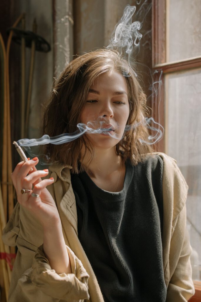 Person smoking cigarette — stop smoking hypnotherapy Melbourne