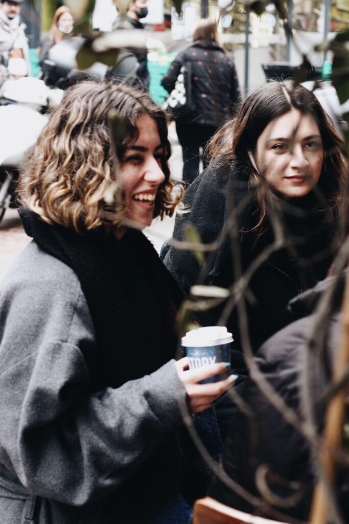 Friends enjoying coffee and conversation together