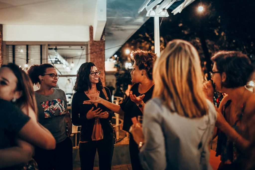 Friends socialising together without vaping